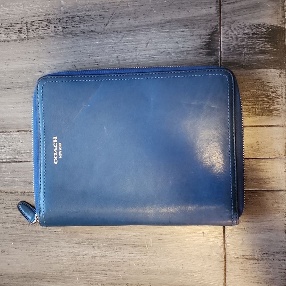100% Authentic Blue Coach leather planner cover with fully functioning zipper.